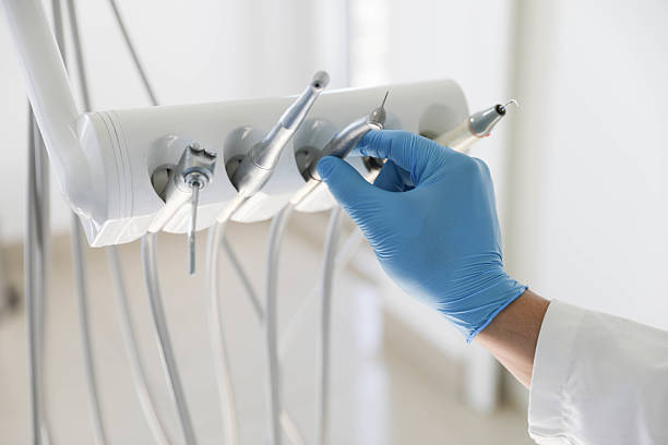 Professional Tooth Extraction technician working in Olmos Park, TX